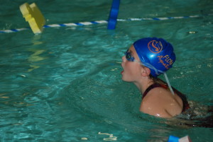 girl-in-a-blue-swim-swimming-in-a-pool
